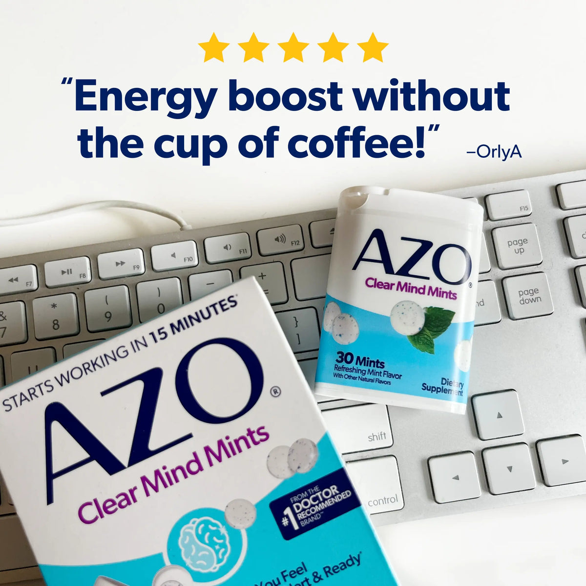 AZO Clear Mind Mints packaging shown on a white background with a keyboard and a user review quote at the top. The image features a large box in the foreground and a single mint packet behind it.