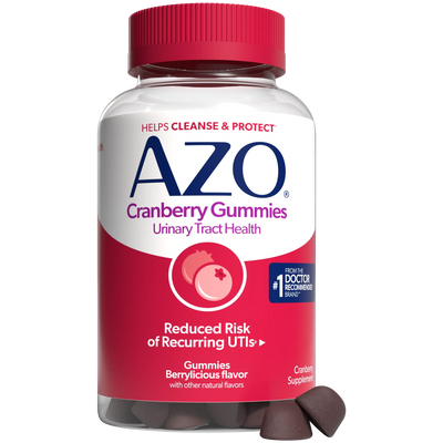 A bottle of Azo Cranberry Gummies with a red cap and a white and red label, shown on a plain white background with several dark brown gummies resting at the base.