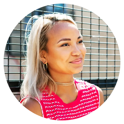 woman staring at the camera wearing bicycle gloves