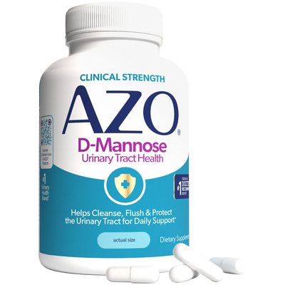 A white bottle of AZO D-Mannose dietary supplement with a blue and white label, shown on a white background with three white capsules in front.