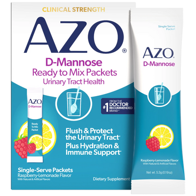 AZO D-Mannose dietary supplement packaging showing a large retail box and a single-serve packet in Raspberry-Lemonade flavor on a white background.