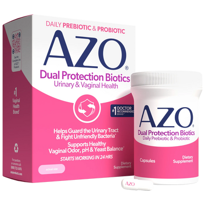 AZO Dual Protection Biotics dietary supplement shown with its retail box, a white bottle with a pink label, and two capsules on a clean white background.