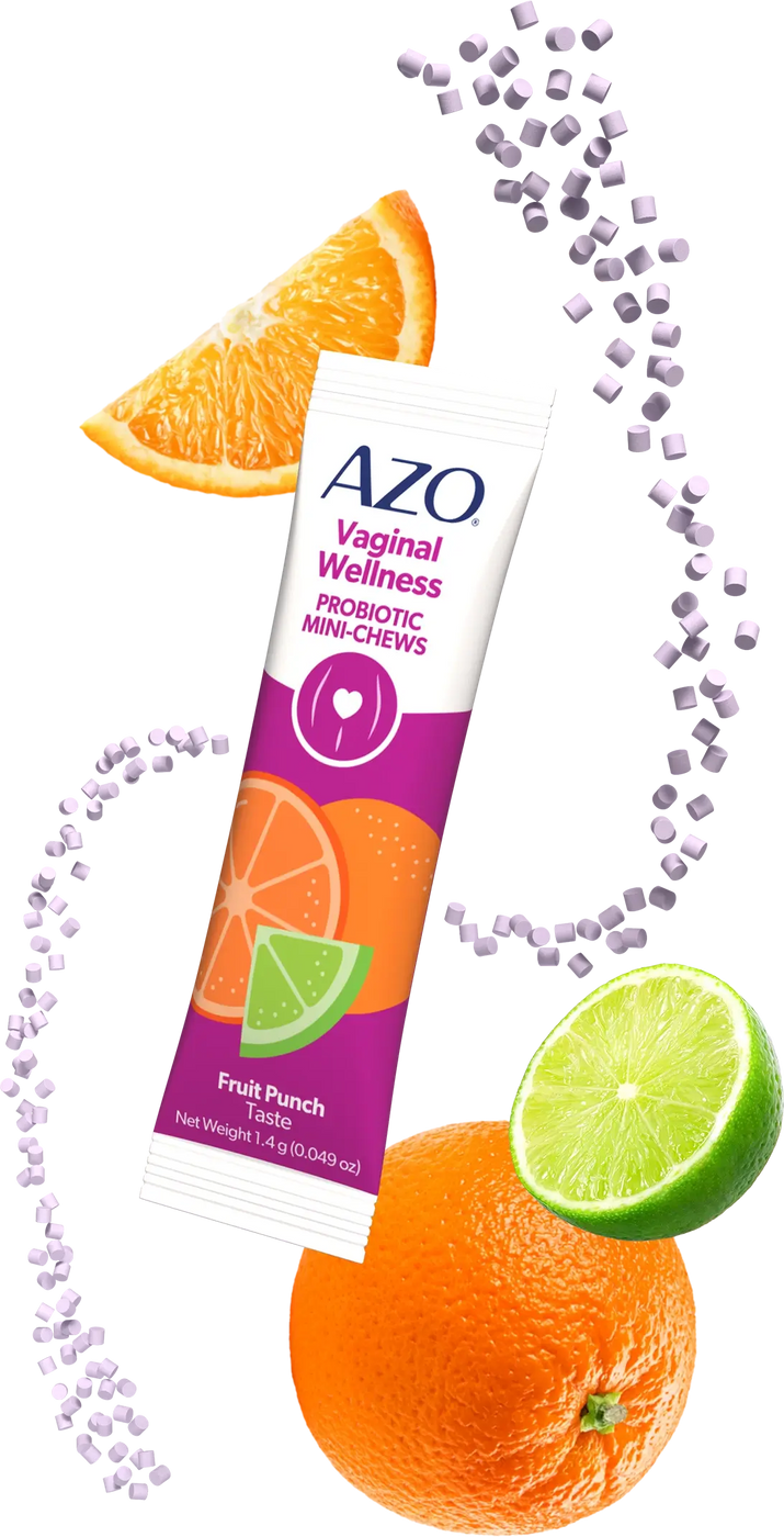 AZO Vaginal Wellness Probiotic Tablets with fruit punch flavor, surrounded by orange and lime slices on a white background.