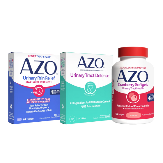 Three AZO health product items on a plain white background: a blue and white Urinary Pain Relief box, a mint and white Urinary Tract Defense box, and a white bottle of Cranberry Softgels with a red cap.